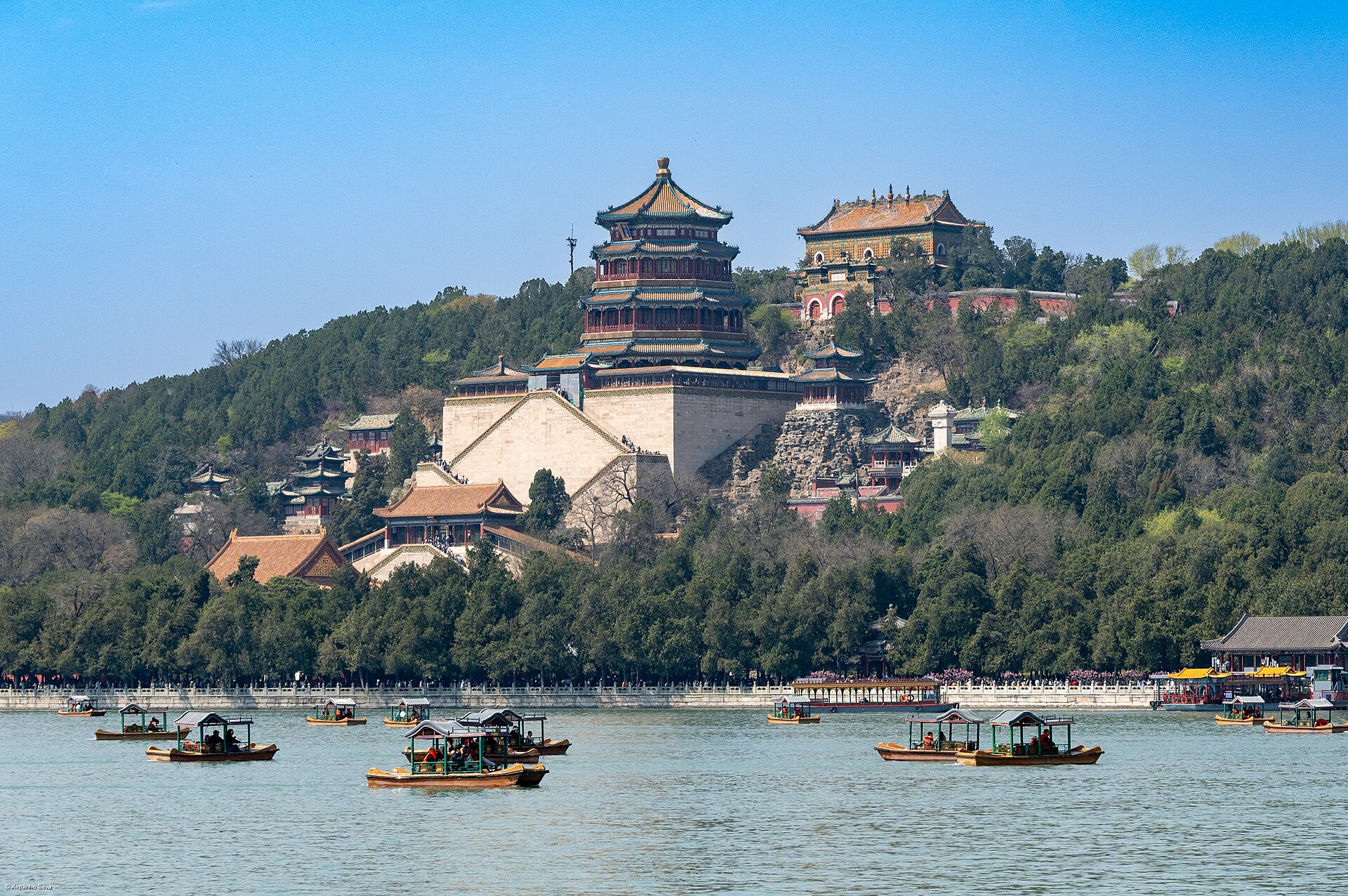 Longevity Hill and palace buildings rising above Kunming Lake at Beijing's Summer Palace in April 2025.