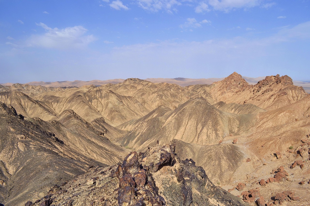 Rocky ridges in Sanwei Mountain near Dunhuang beneath a blue sky